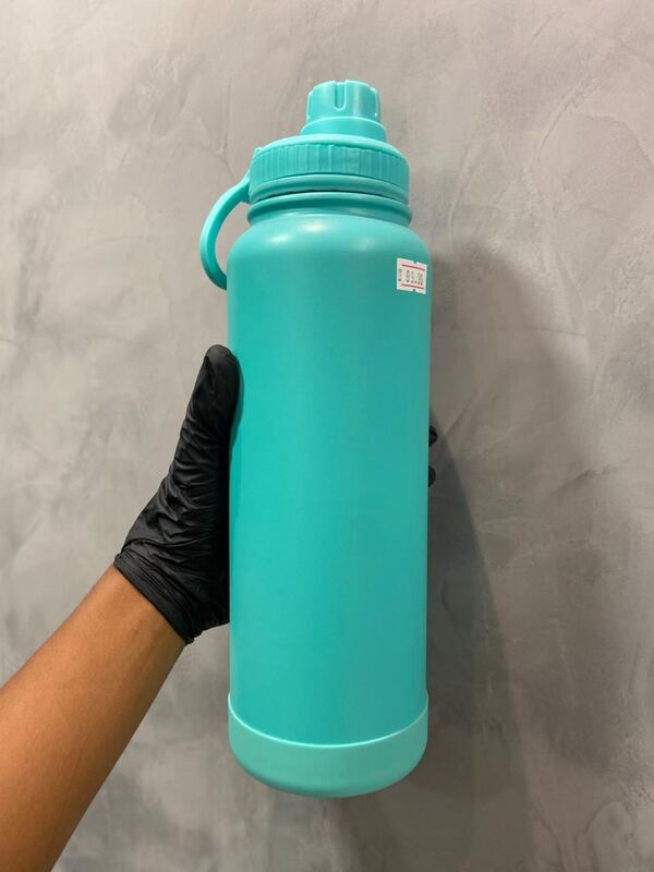 Garrafa Térmica Turquesa Isolada